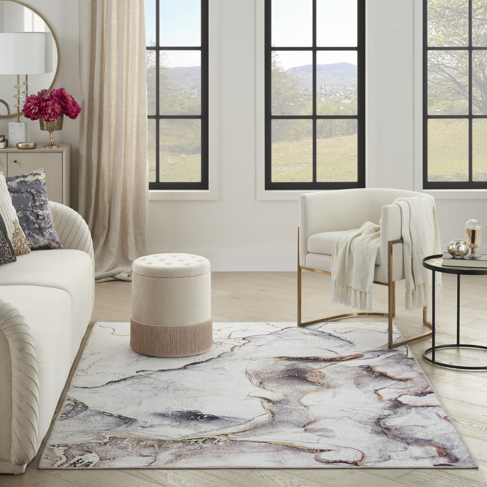 5' X 7' Black and Gold Abstract Power Loom Area Rug