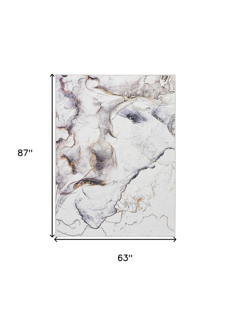 5' X 7' Black and Gold Abstract Power Loom Area Rug