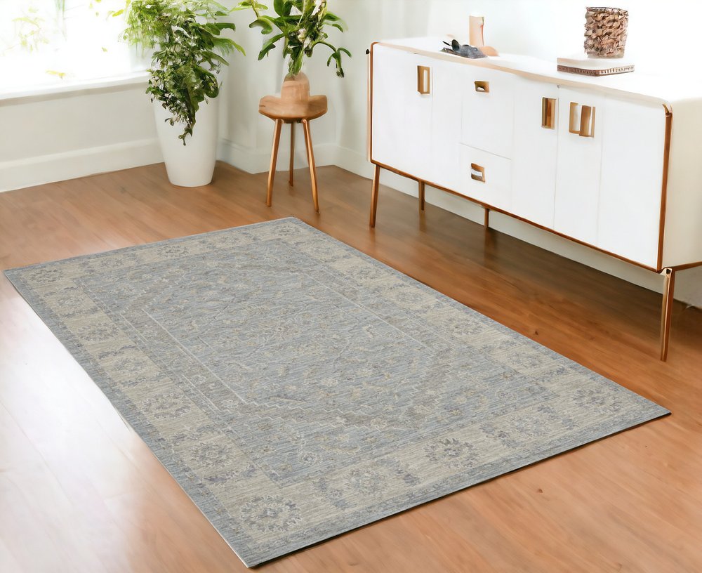 4' X 6' Beige and Blue Floral Power Loom Area Rug