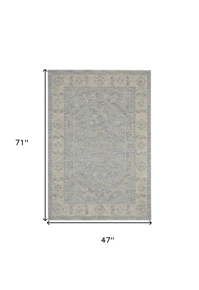 4' X 6' Beige and Blue Floral Power Loom Area Rug