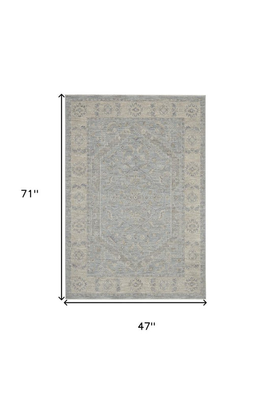 4' X 6' Beige and Blue Floral Power Loom Area Rug