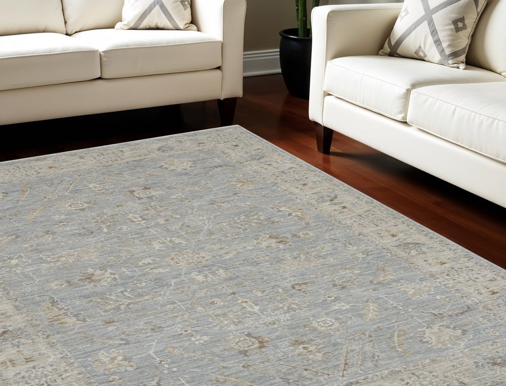 5' X 8' Beige and Blue Floral Power Loom Area Rug