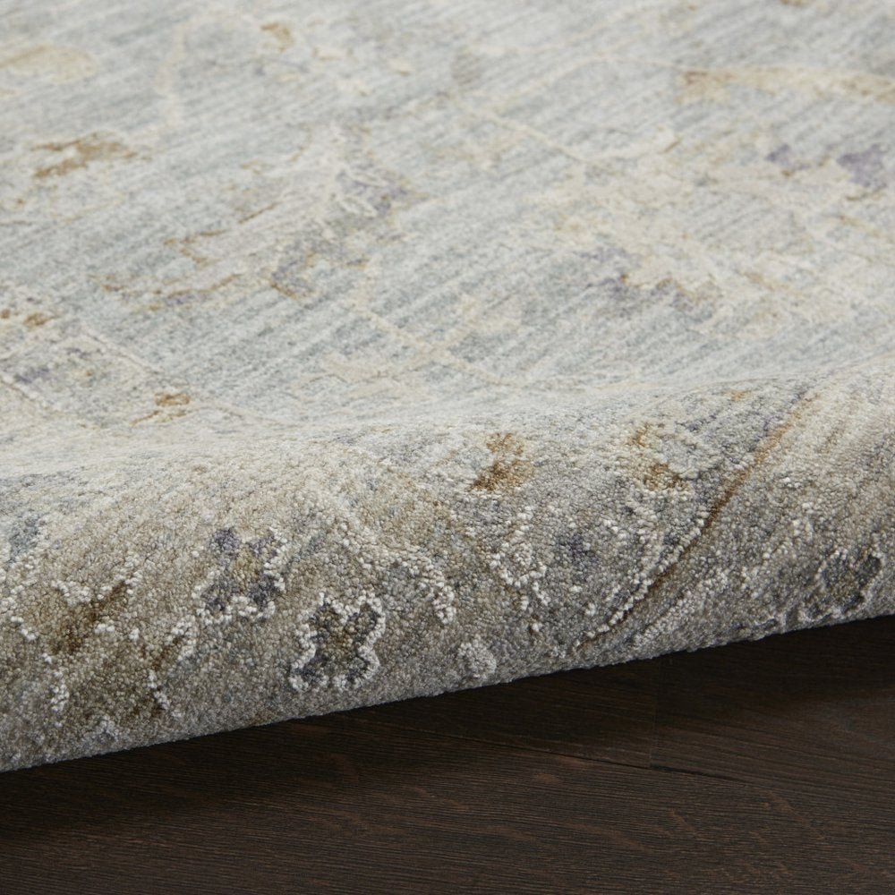 5' X 8' Beige and Blue Floral Power Loom Area Rug