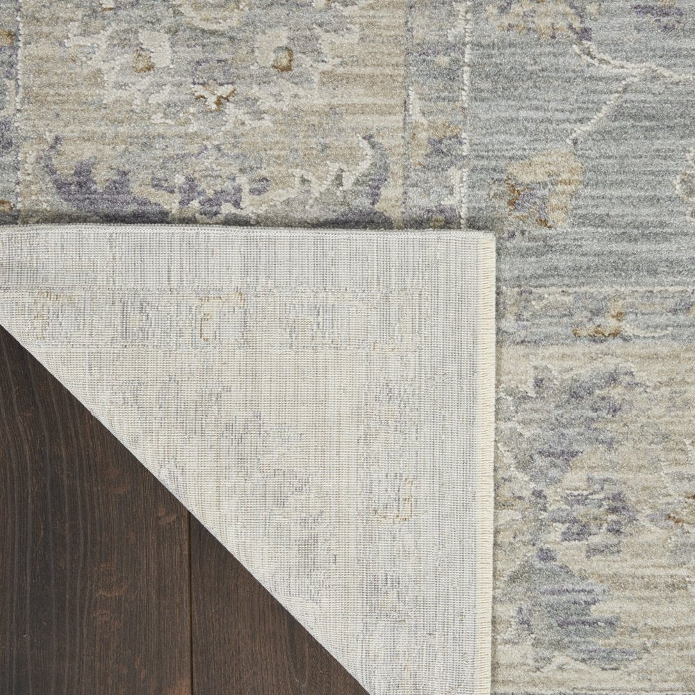 5' X 8' Beige and Blue Floral Power Loom Area Rug