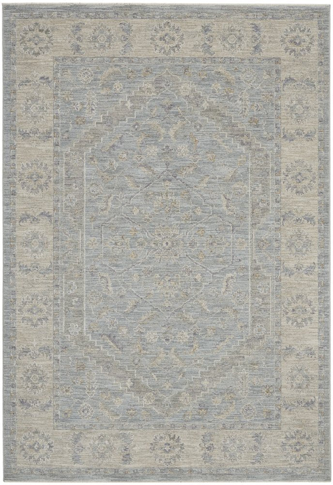 5' X 8' Beige and Blue Floral Power Loom Area Rug