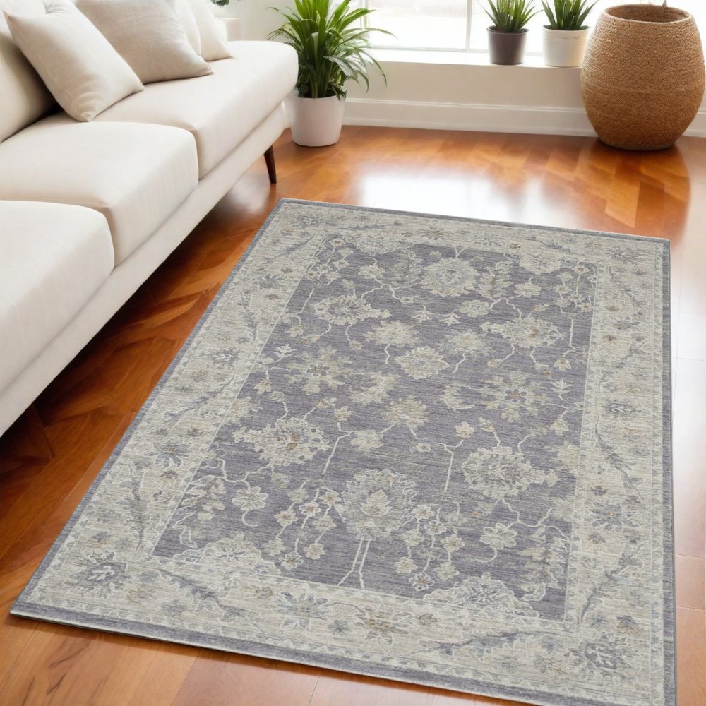 5' X 8' Ivory and Gray Floral Power Loom Area Rug