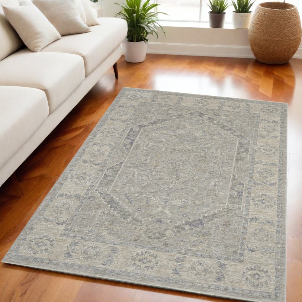 5' X 8' Beige and Gray Floral Medallion Power Loom Area Rug
