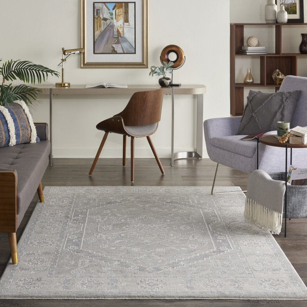 5' X 8' Beige and Gray Floral Medallion Power Loom Area Rug