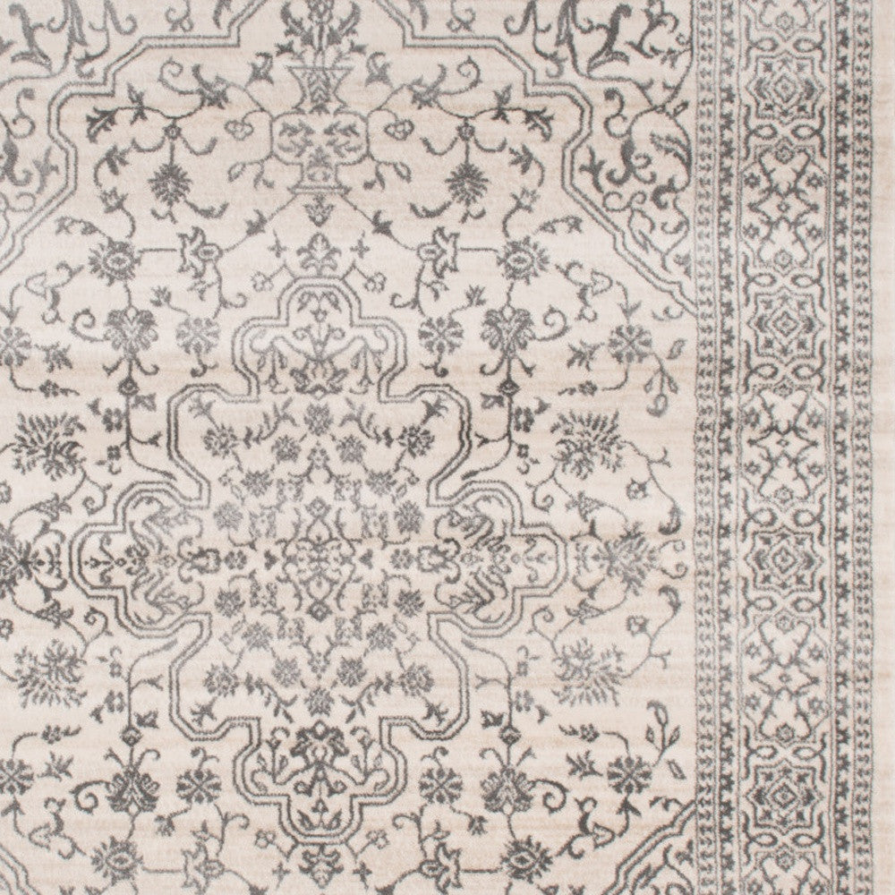 5' X 8' Ivory and Gray Oriental Area Rug