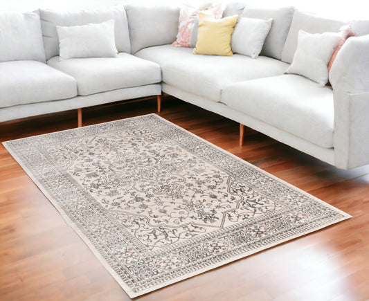 5' X 8' Ivory and Gray Oriental Area Rug