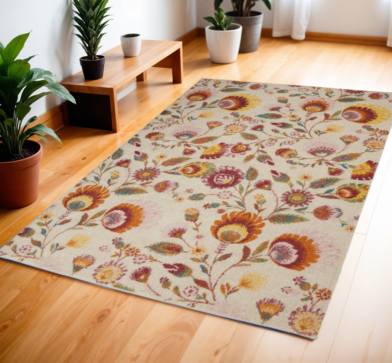 4' X 6' Orange and Ivory Floral Power Loom Area Rug