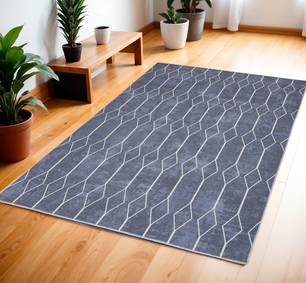 4' X 6' Blue And Ivory Geometric Area Rug