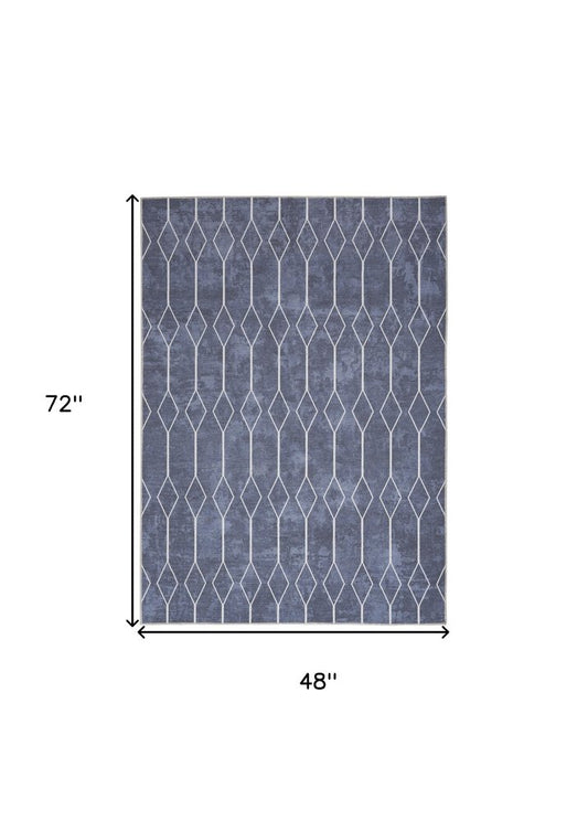 4' X 6' Blue And Ivory Geometric Area Rug