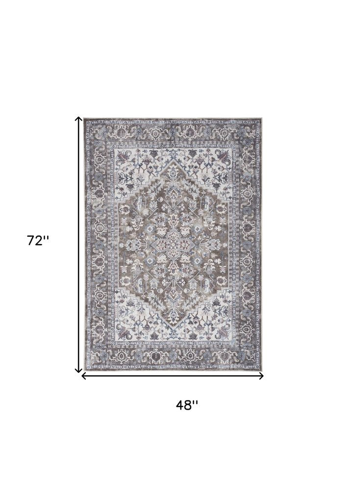 4' X 6' Green and Ivory Floral Medallion Power Loom Distressed Area Rug