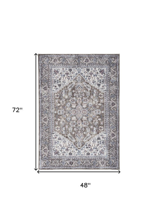 4' X 6' Green and Ivory Floral Medallion Power Loom Distressed Area Rug