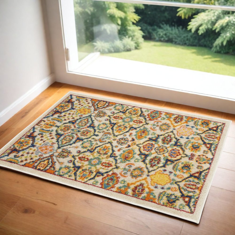 3' X 5' Beige and Blue Floral Power Loom Area Rug