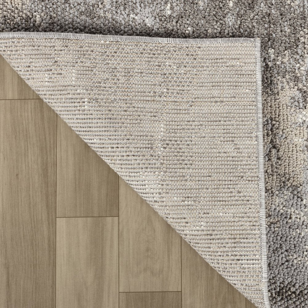 5' X 8' Gray and Ivory Abstract Area Rug
