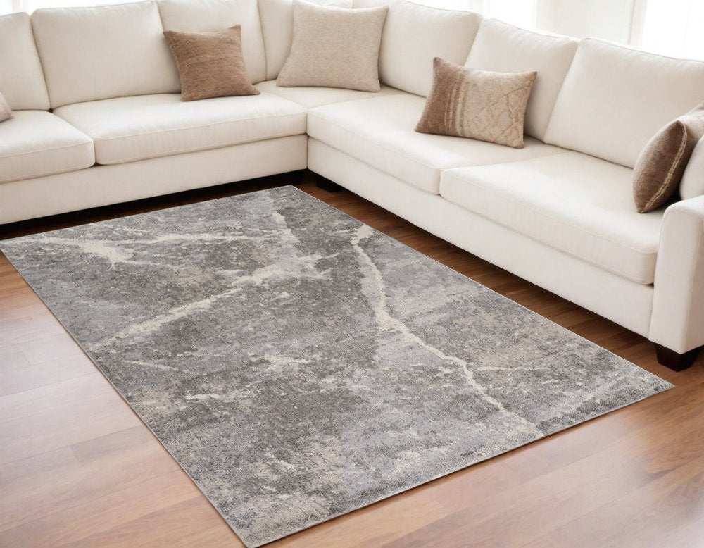 5' X 8' Gray and Ivory Abstract Area Rug