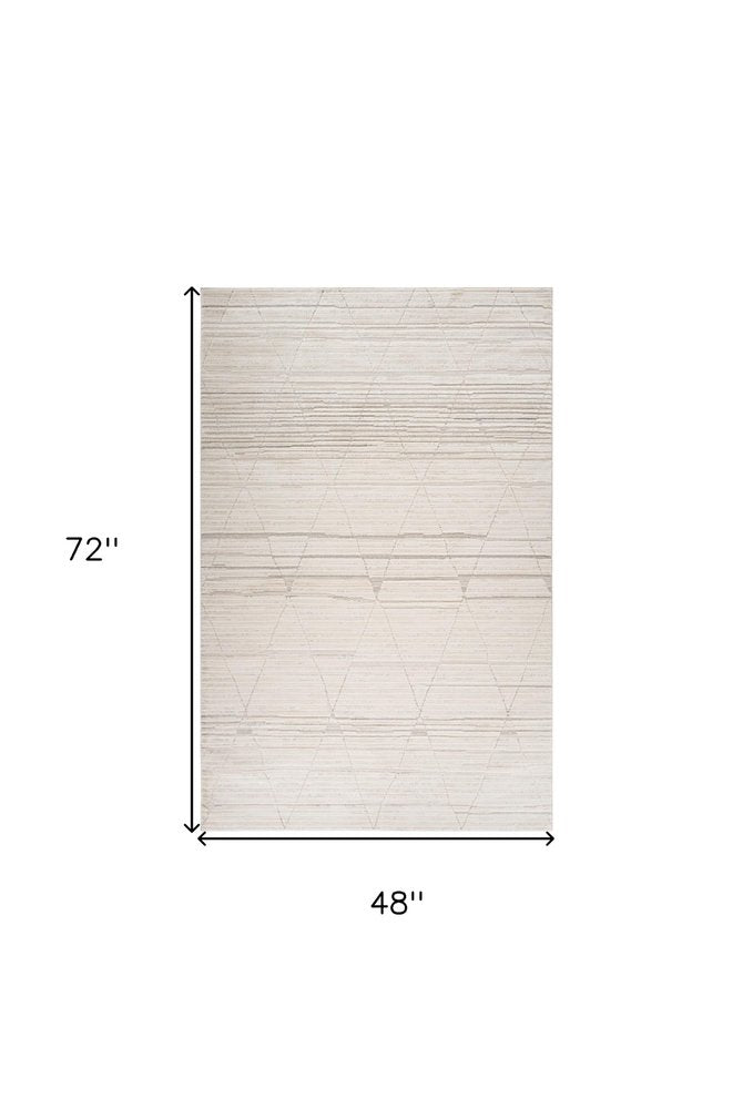 4' X 6' Cream and Beige Abstract Area Rug