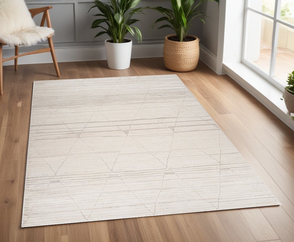 4' X 6' Cream and Beige Abstract Area Rug