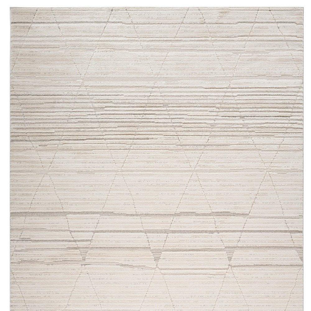 5' X 8' Cream and Beige Abstract Area Rug