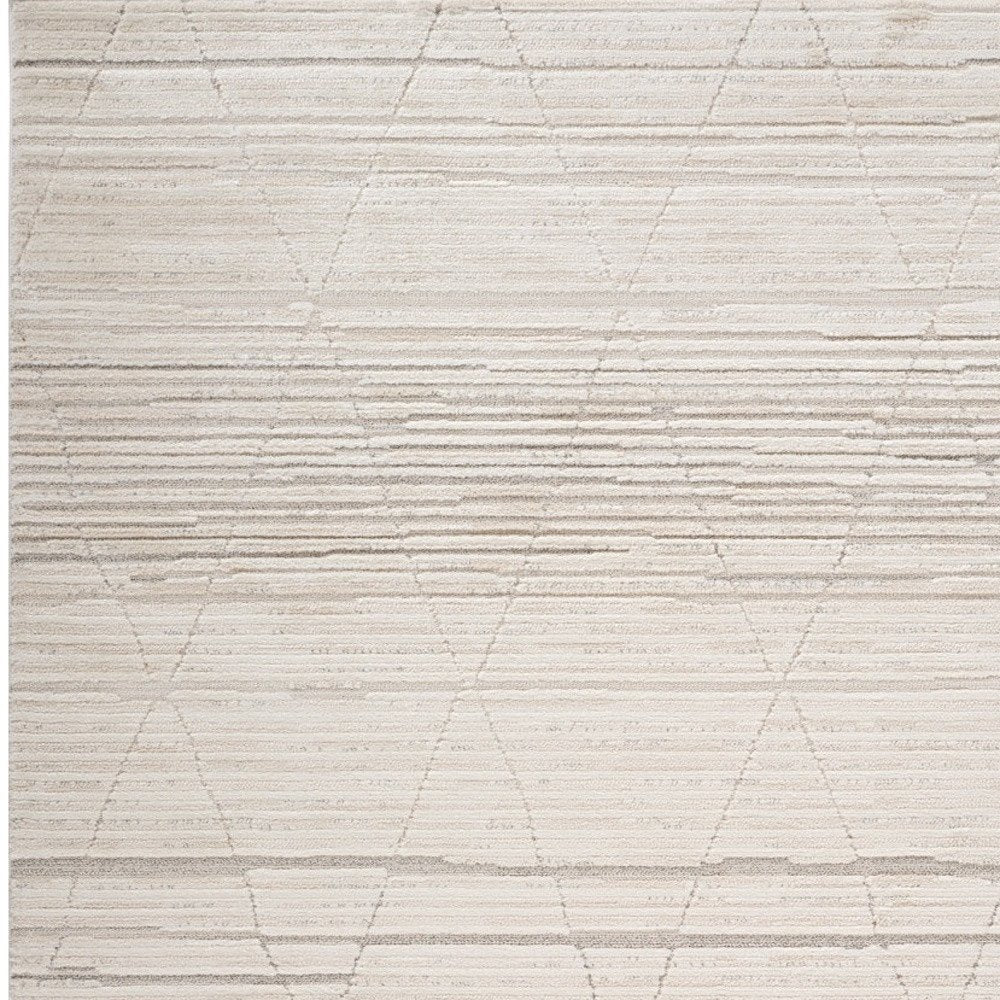 7' X 10' Cream and Beige Abstract Area Rug