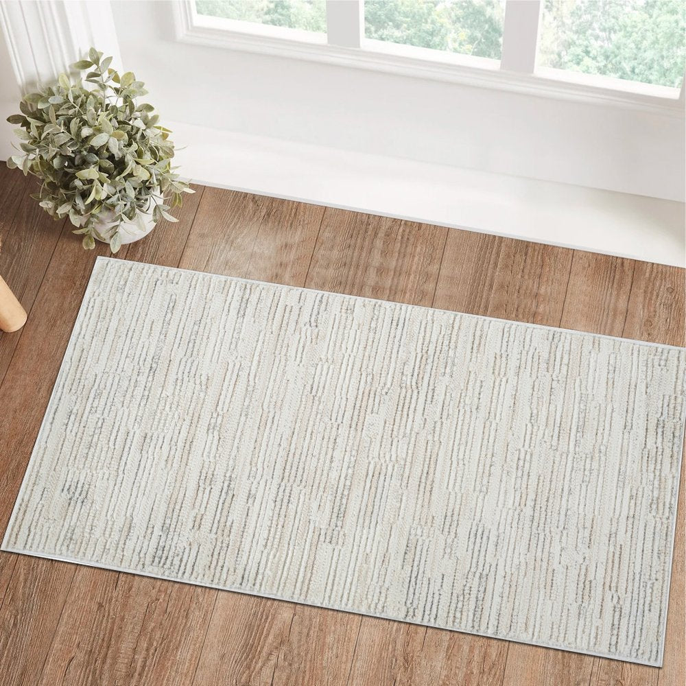 2' X 5' Gray and Beige Geometric Distressed Area Rug