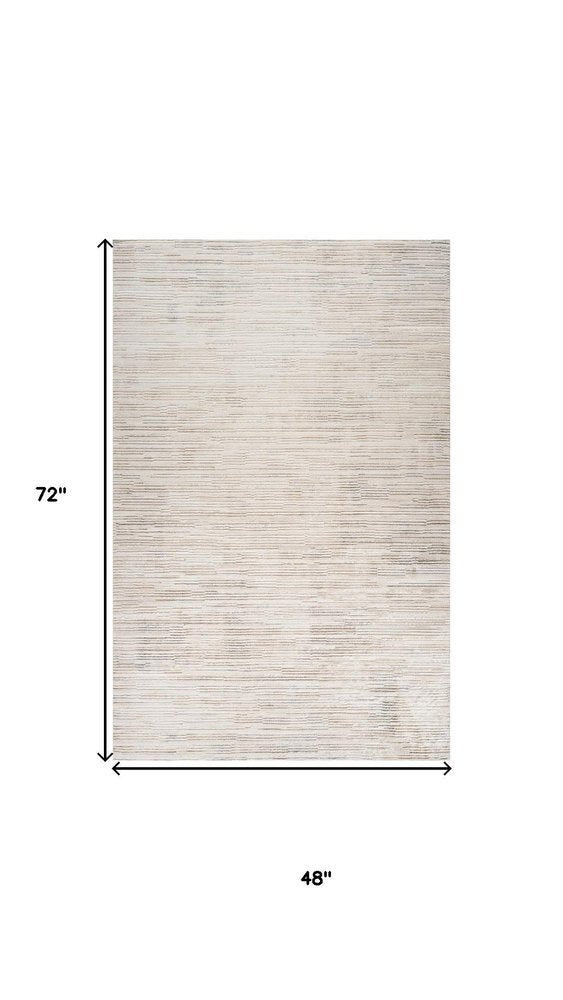 4' X 6' Cream and Beige Abstract Area Rug