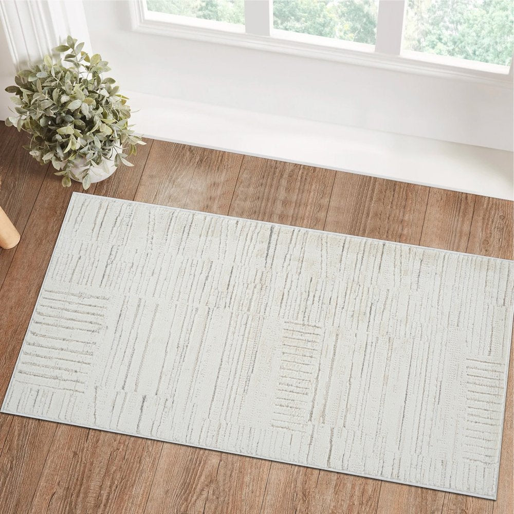 2' X 5' Gray and Beige Geometric Distressed Area Rug