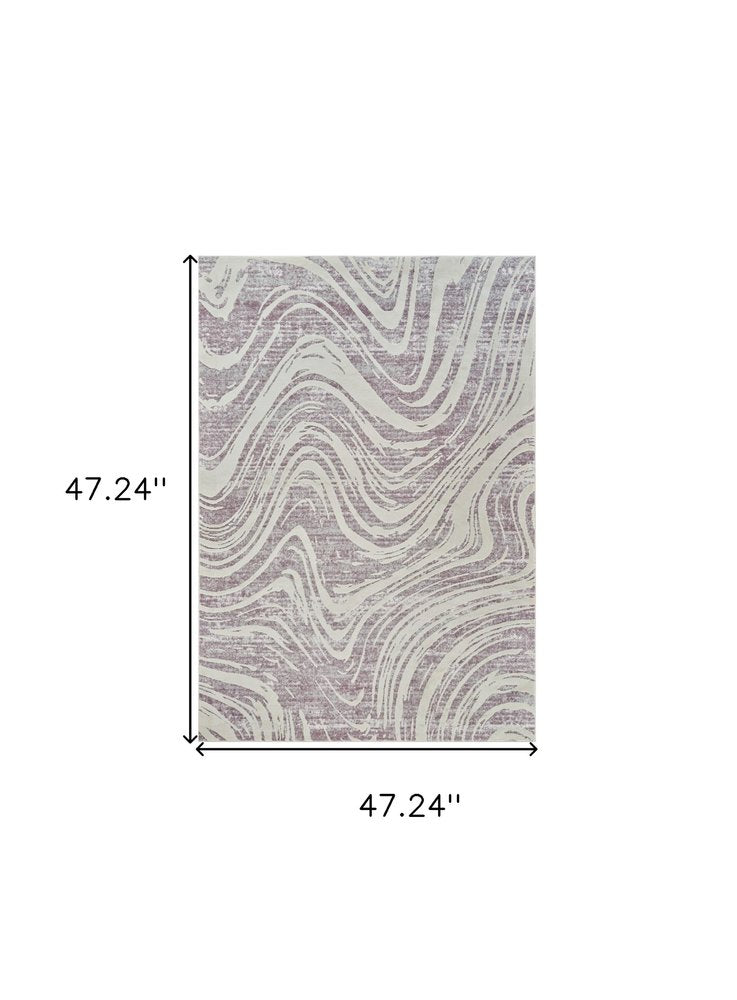 4' X 6' Beige and Purple Abstract Distressed Area Rug