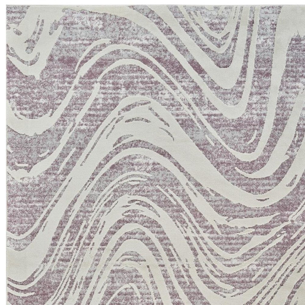 7' X 10' Beige and Purple Abstract Distressed Area Rug