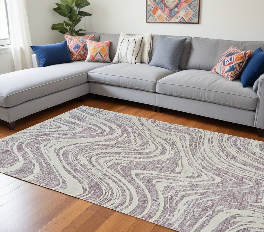7' X 10' Beige and Purple Abstract Distressed Area Rug