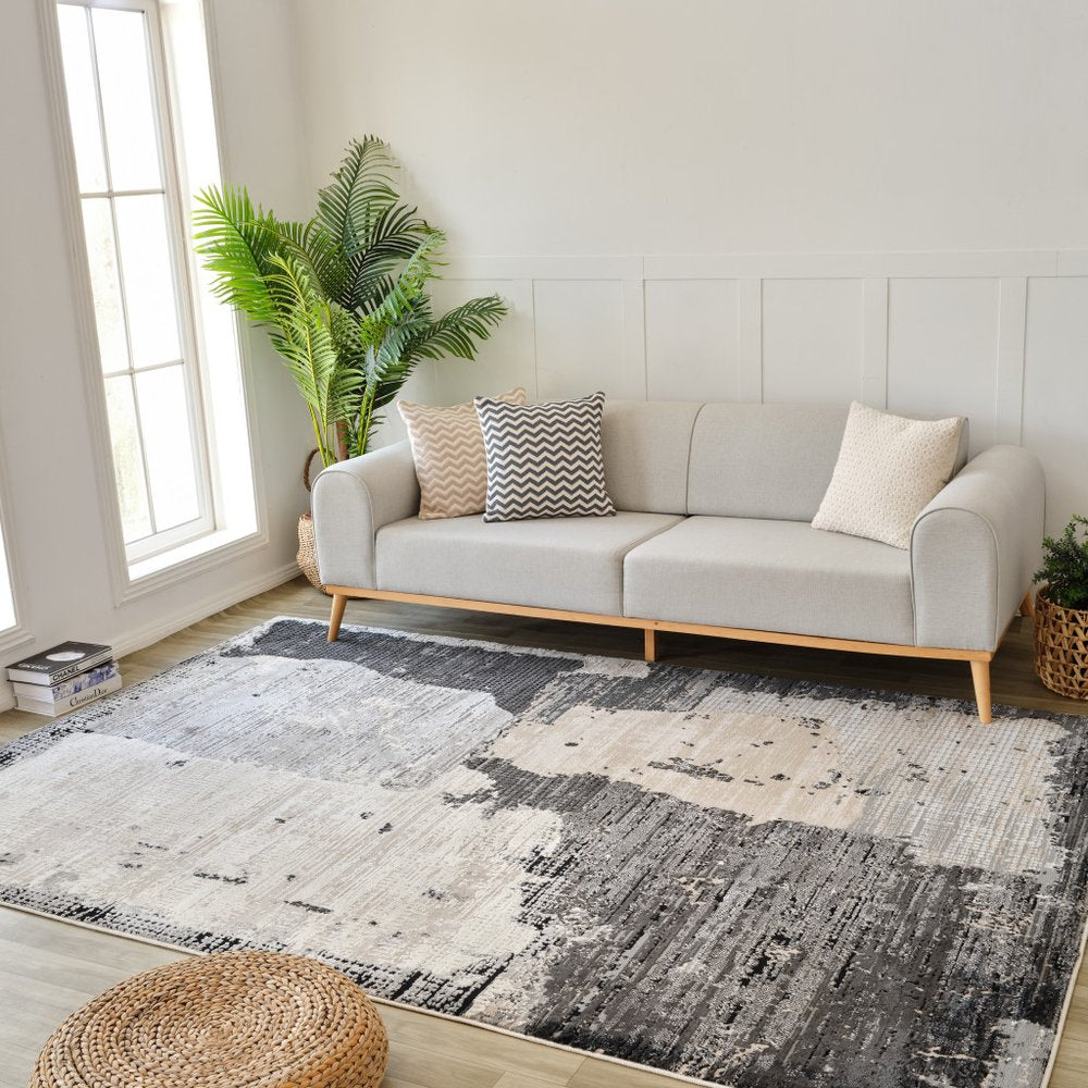 4' X 6' Beige and Black Abstract Distressed Area Rug