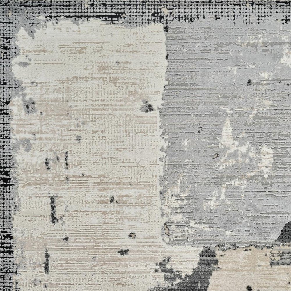 7' X 10' Beige and Black Abstract Distressed Area Rug