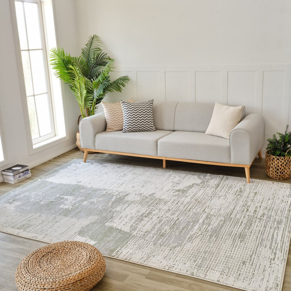 7' X 10' Beige and Green Abstract Distressed Area Rug