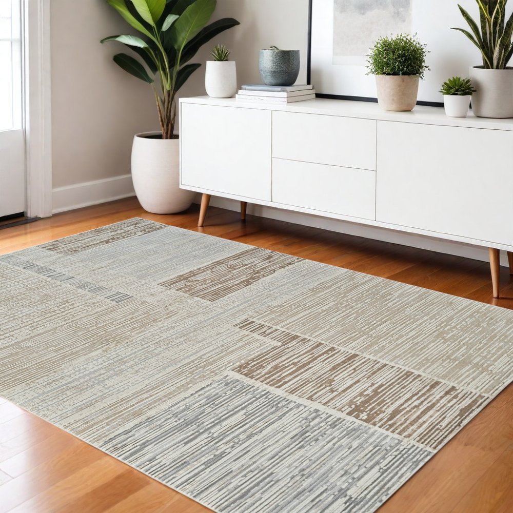 4' X 6' Beige and Brown Abstract Distressed Area Rug