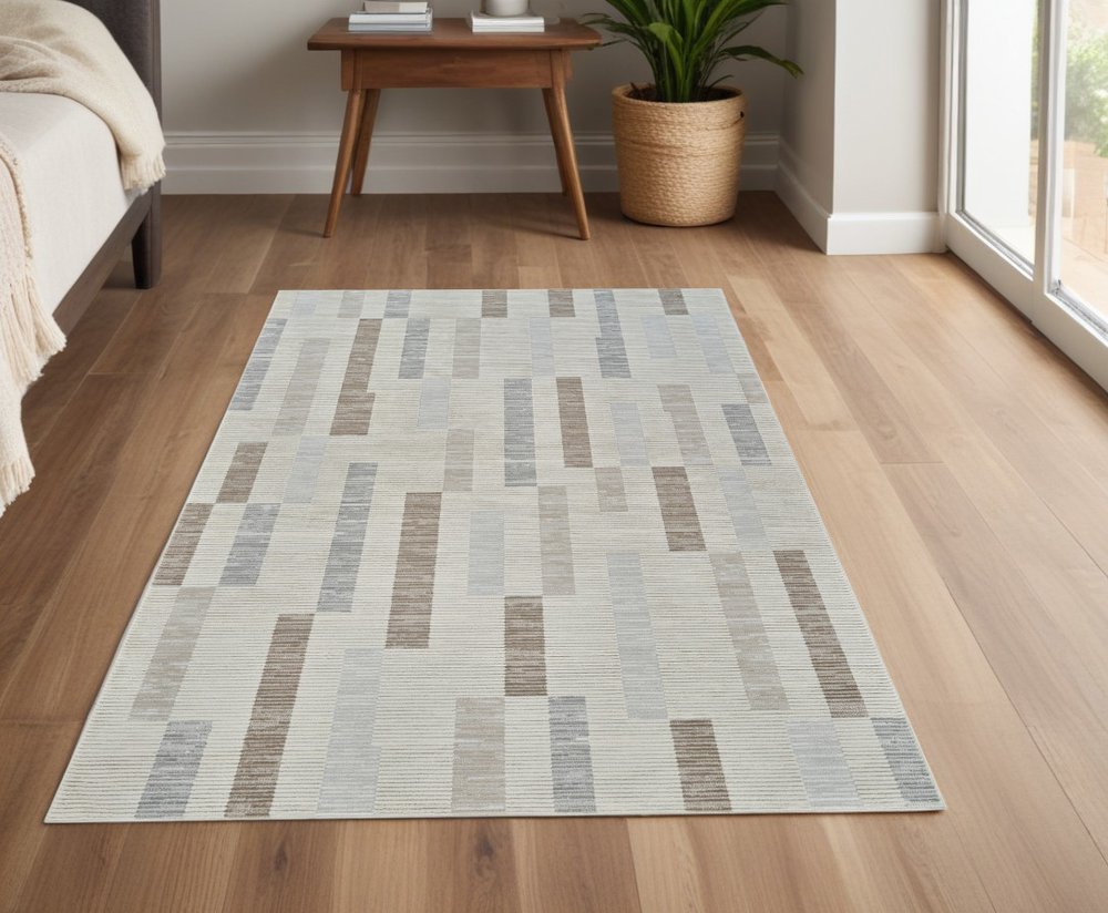4' X 6' Beige and Brown Abstract Distressed Area Rug
