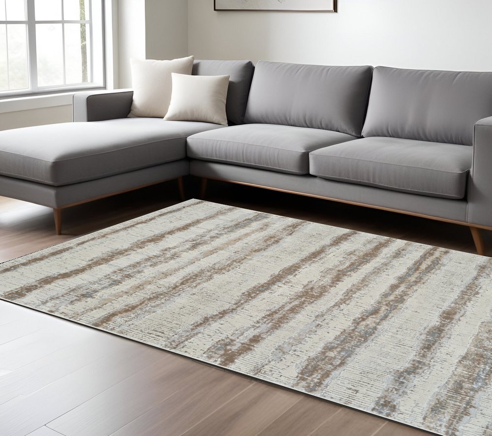 7' X 10' Beige and Brown Abstract Non Skid Area Rug