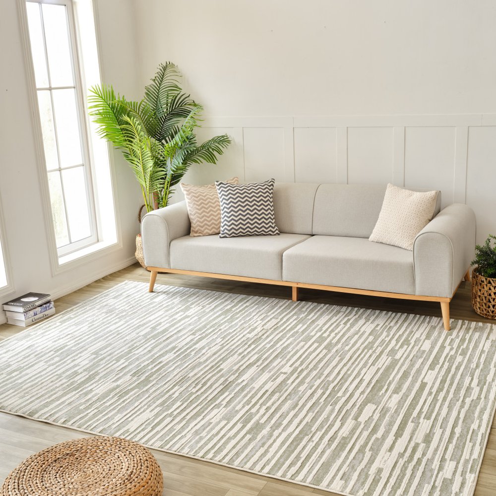 4' X 6' Beige and Green Abstract Distressed Area Rug