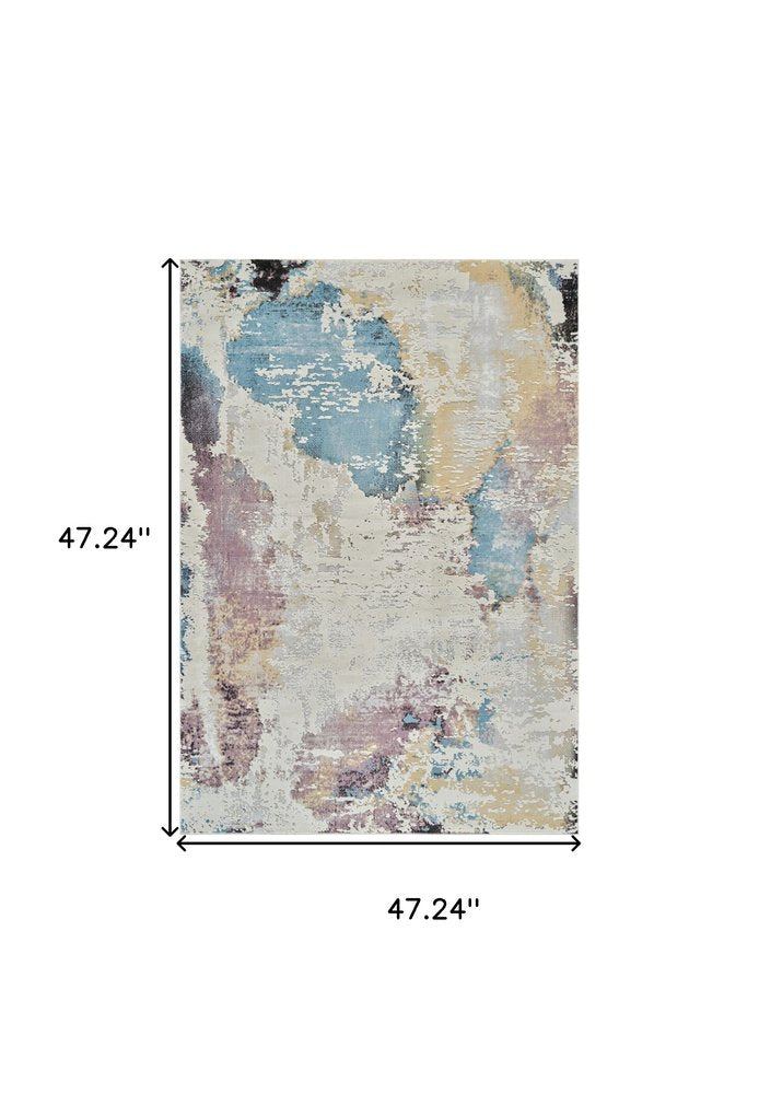 4' X 6' Beige and Blue Abstract Distressed Area Rug