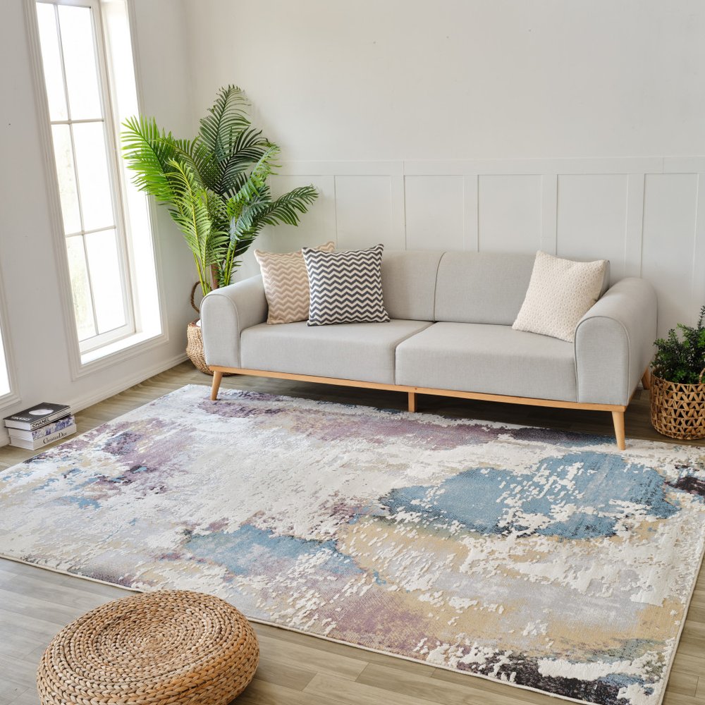 5' X 8' Beige and Blue Abstract Distressed Area Rug
