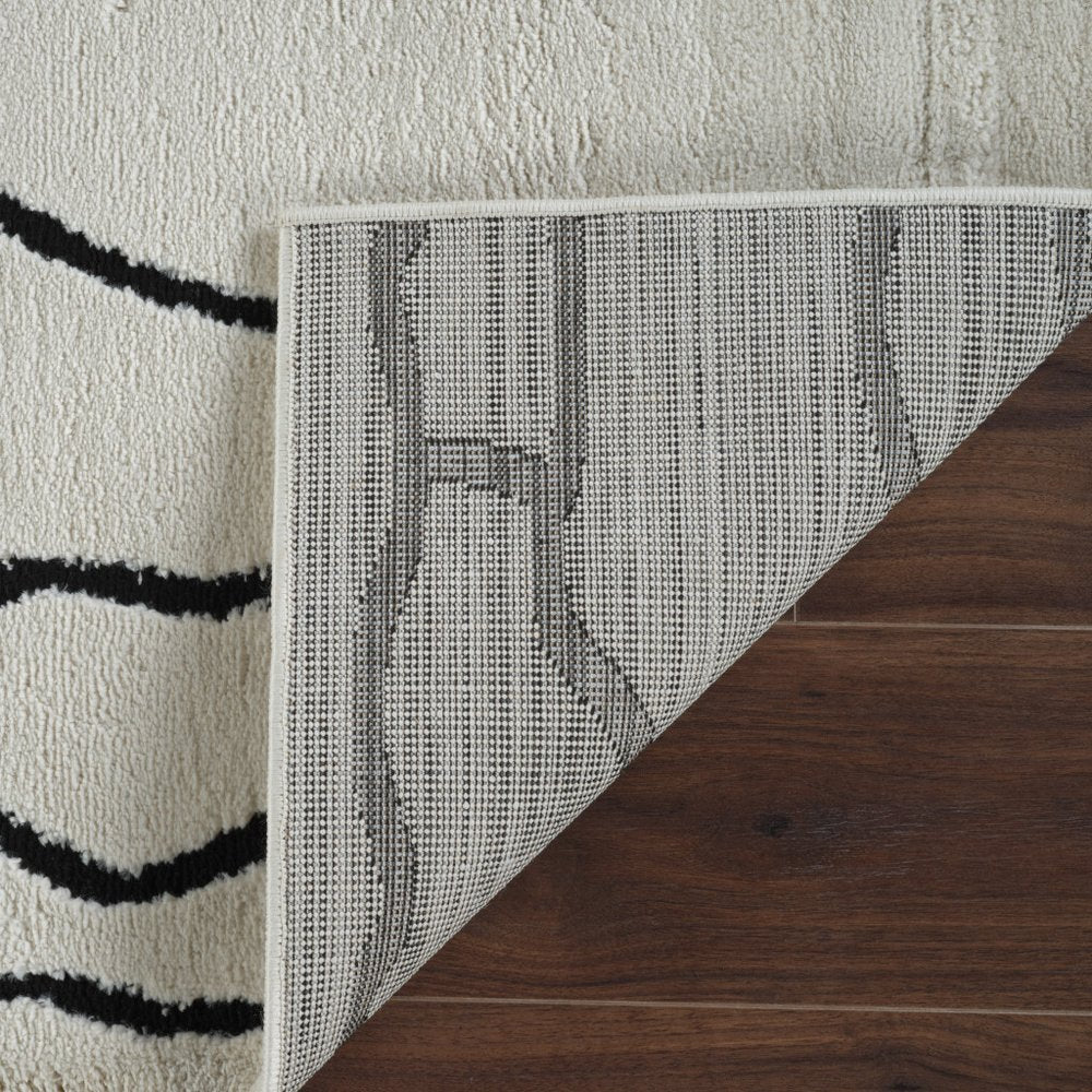 4' X 6' Cream and Black Abstract Distressed Area Rug