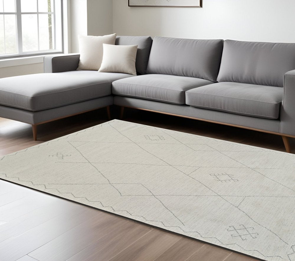 7' X 10' Cream and Beige Abstract Non Skid Area Rug