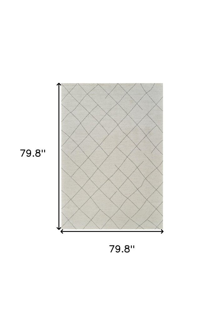 7' X 10' Cream and Beige Abstract Distressed Area Rug