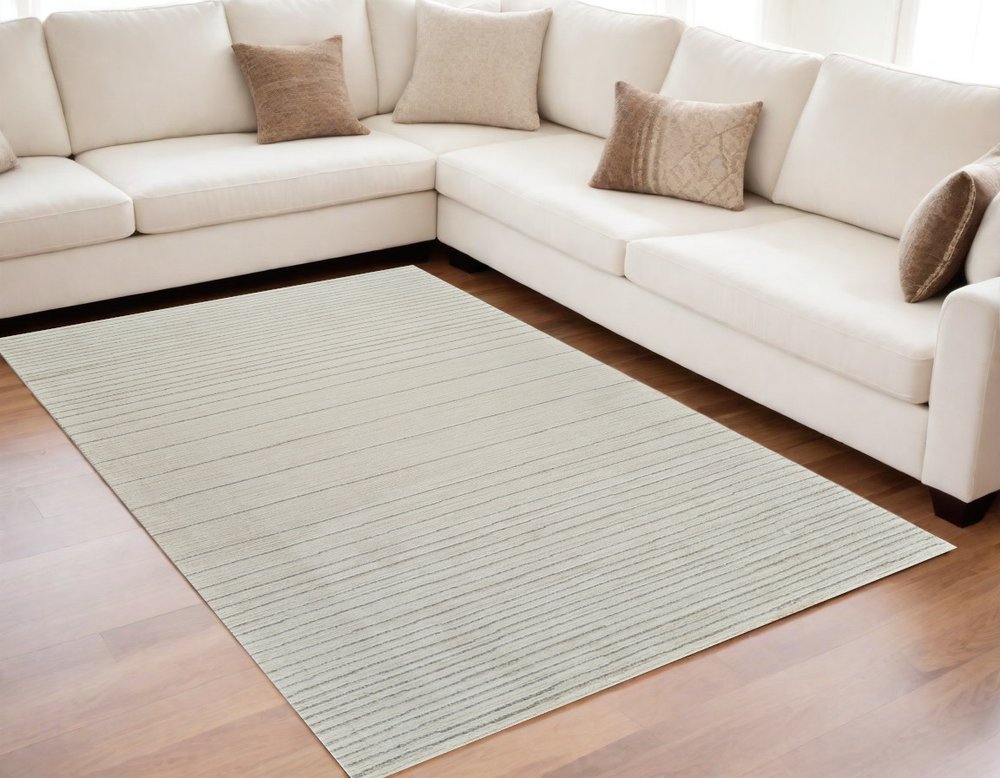 5' X 8' Cream and Beige Abstract Non Skid Area Rug