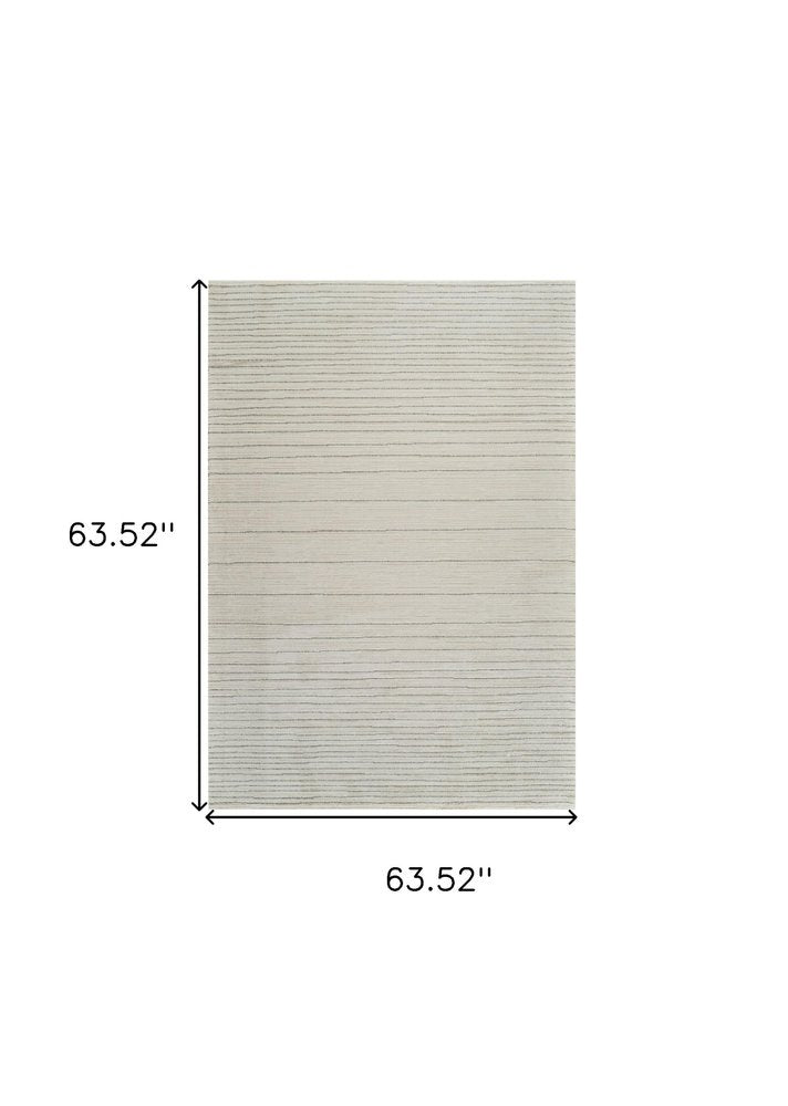 5' X 8' Cream and Beige Abstract Non Skid Area Rug