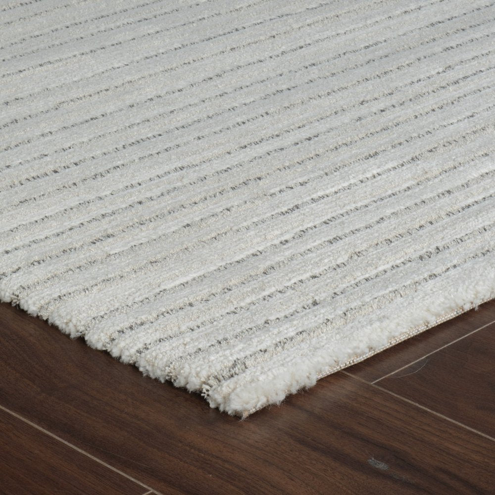 7' X 10' Cream and Beige Abstract Non Skid Area Rug