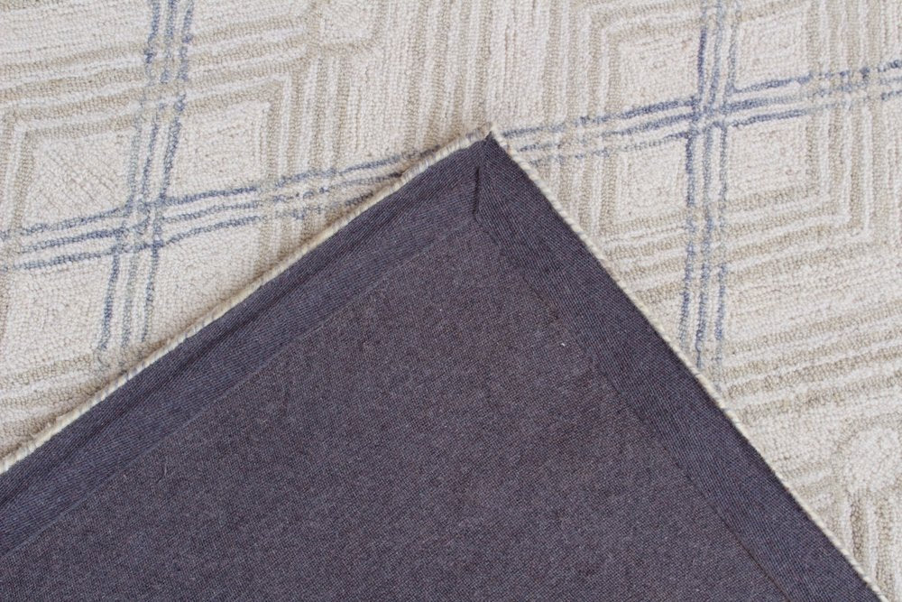 5' X 8' Ivory Wool Abstract Geometric Hand Tufted Non Skid Area Rug