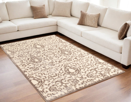 5' X 8' Taupe and Tan Floral Power Loom Area Rug