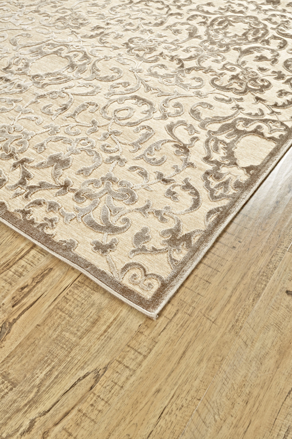 5' X 8' Taupe and Tan Floral Power Loom Area Rug